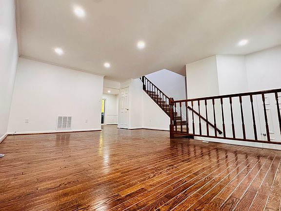 Spacious hardwood floor living room