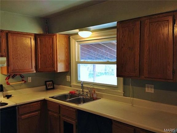 Plenty of counter space, look out to covered patio.