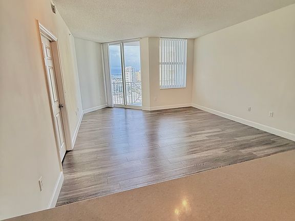 Open Kitchen looks out to spacius living/dining area