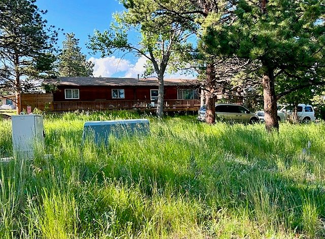 Exterior. 3/4 acre. Detached garage with garage apartment above
