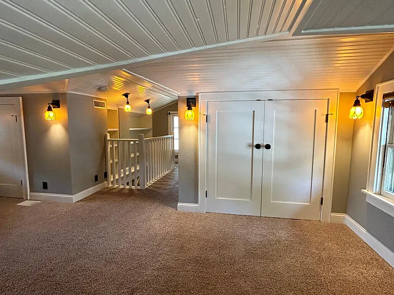 View from the built-in bed. Plenty of built-in bookshelves provide plenty of storage options.