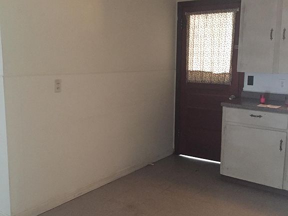 Kitchen leading to laundry/mud room