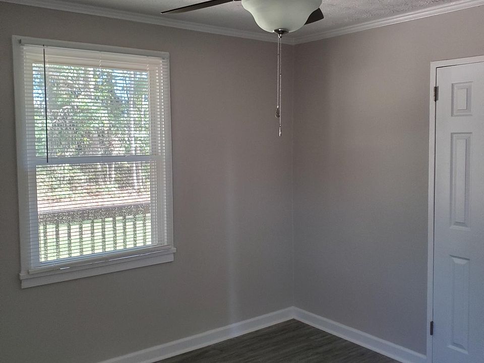 Bedroom 1 with view of front yard