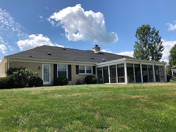Enclosed porch & back yard.