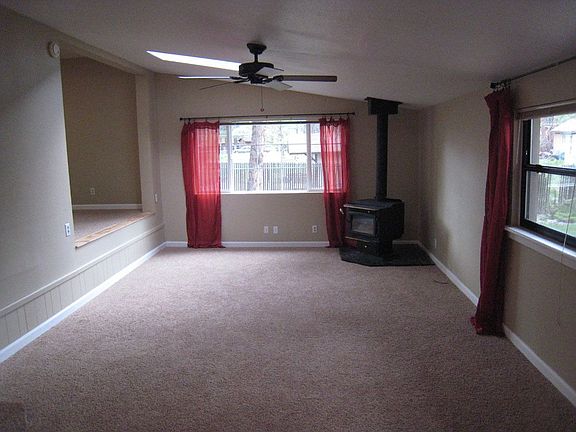 Family room with wood burning stove.