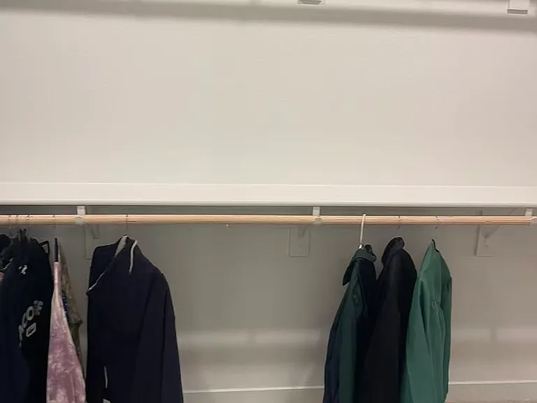 Closet of one of the bedrooms.