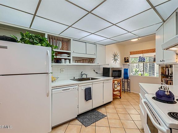 5th image of 10923 W COGGINS Drive