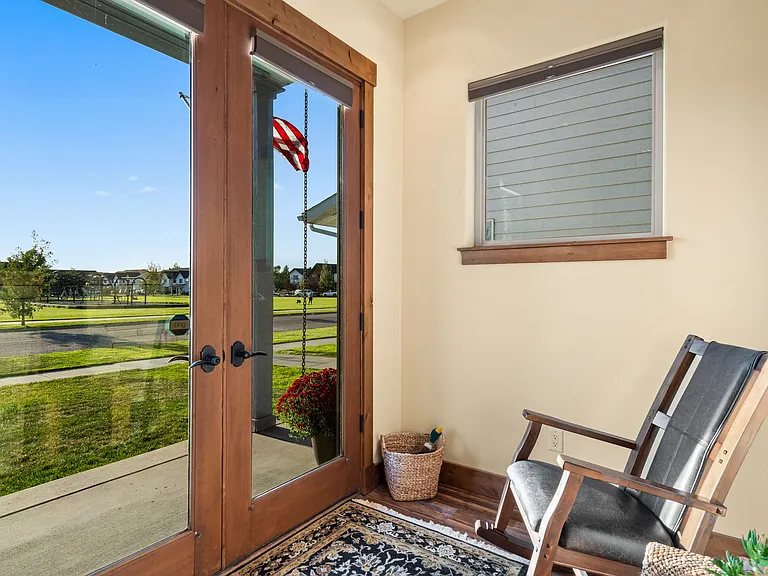 Foyer sitting area with view of park.