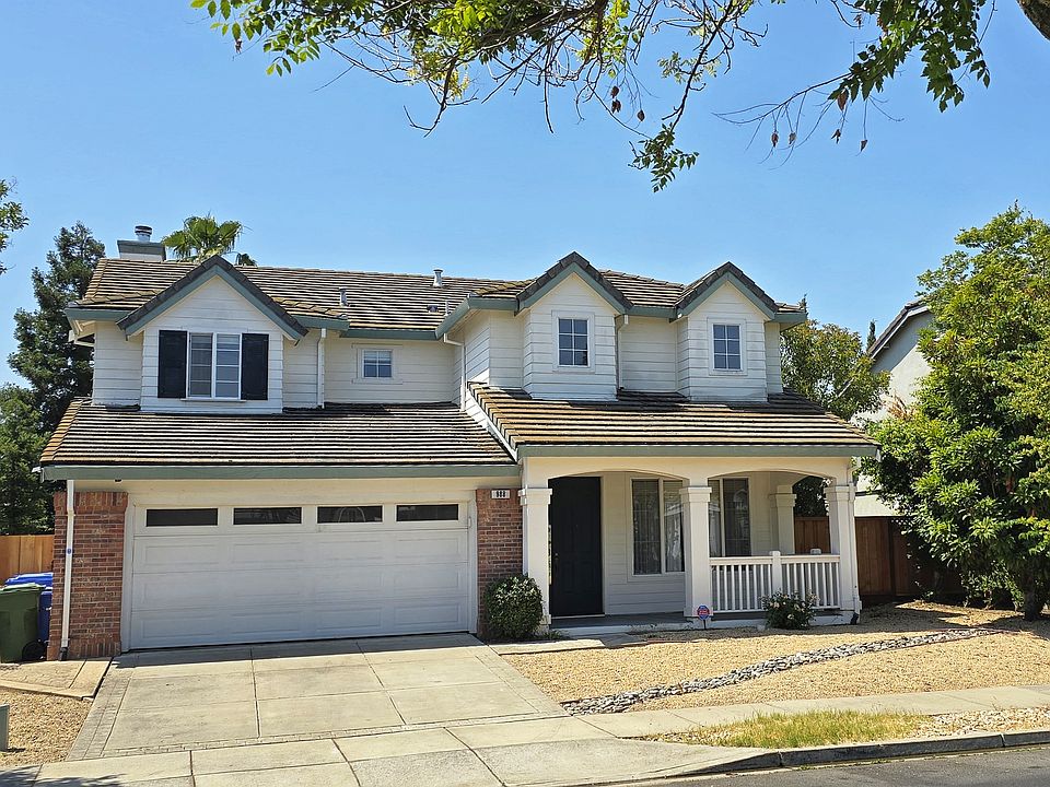 Beautiful Front Elevation with 3 Car Tandem Garage
