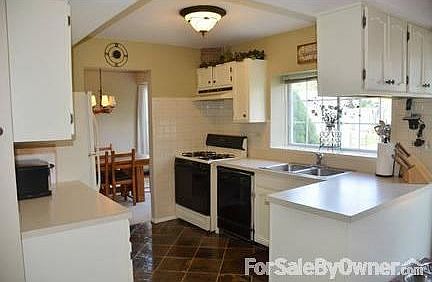 Kitchen
						:
						Garbage disposal, dishwasher, beautiful white cabinets
