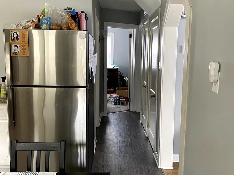 Vinyl flooring in kitchen and 1st floor hallway.