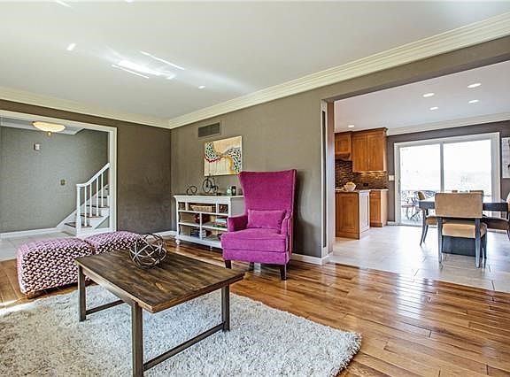 Living room flows into dining room