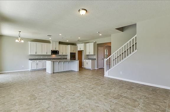 great room with ceramic tiles