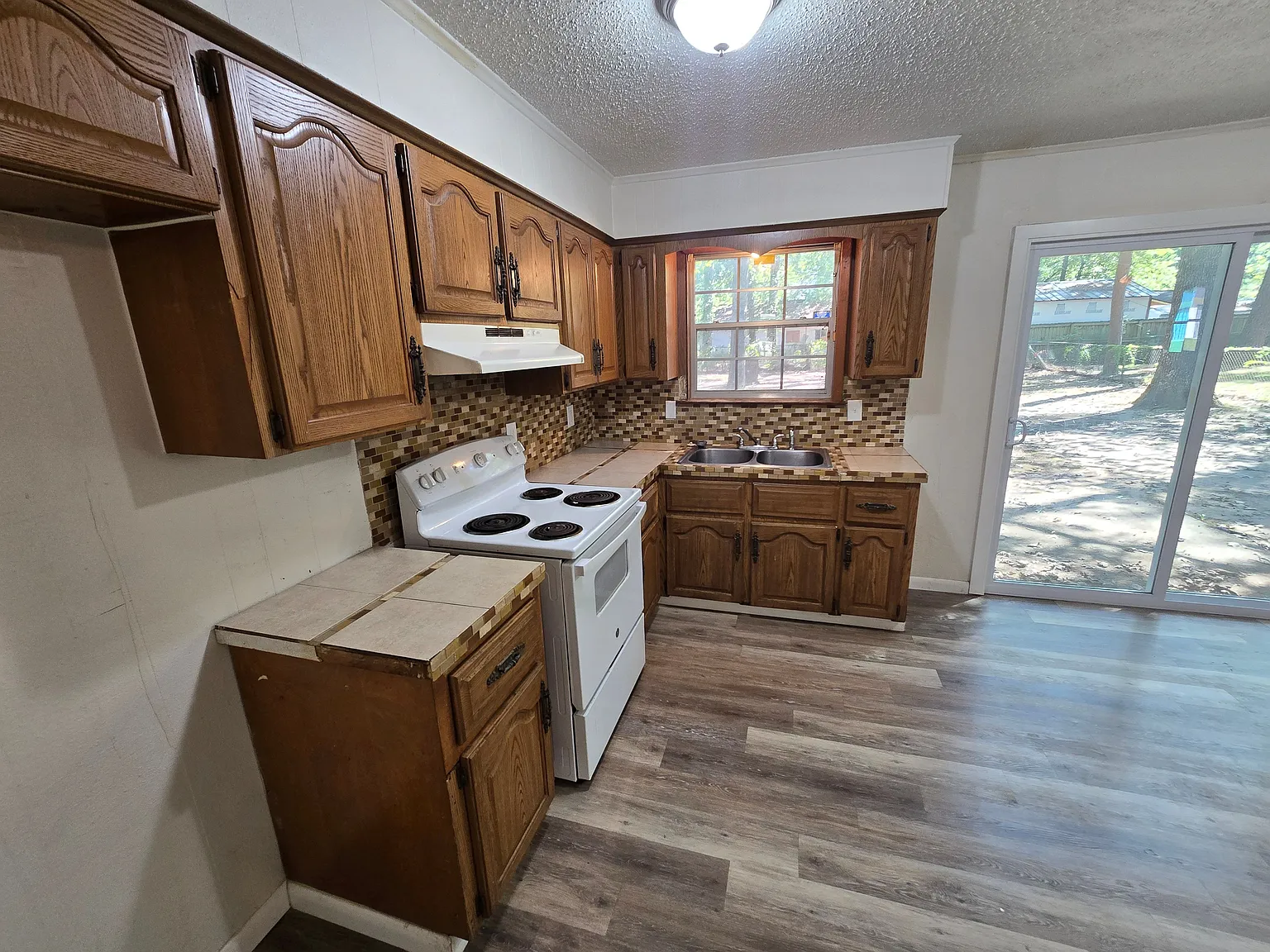 Charming 3-Bed Home with Carport, Spacious Backyard & Stylish Upgrades — Photo 4