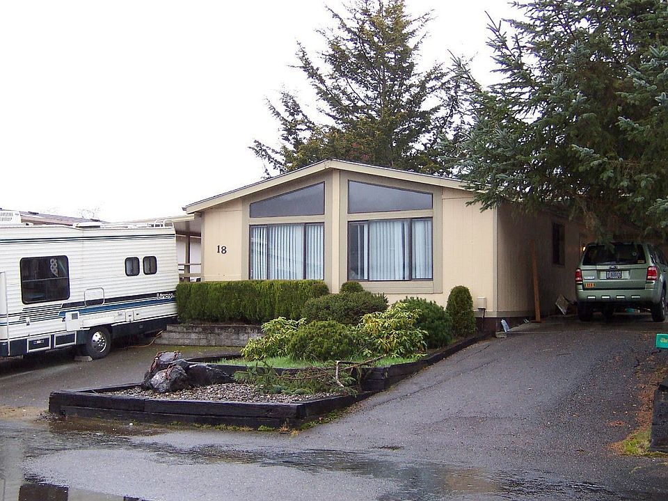 Front view w/covered parking