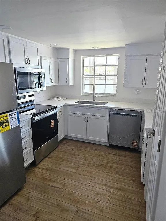 Building Photo - 8822 Bay Pointe Dr #104