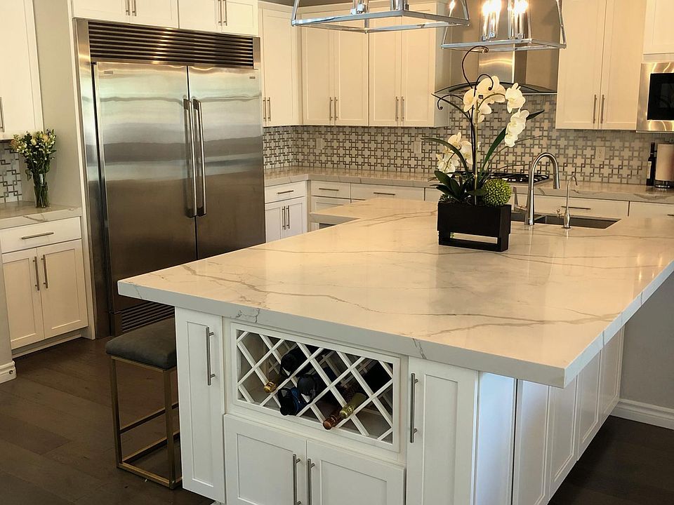 Large kitchen with 6 foot fridge/freezer, ice machine, double oven, dishwasher, built in microwave, and 5 burner stove.