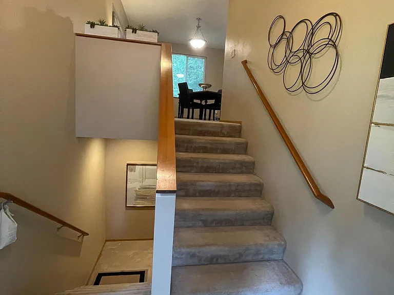 Stairs from foyer to first floor