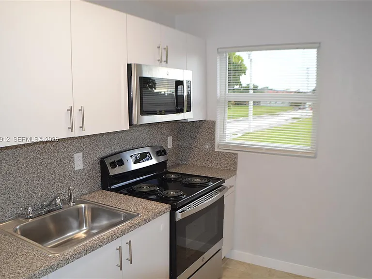 1398 NW 61st St #6 — Photo 5