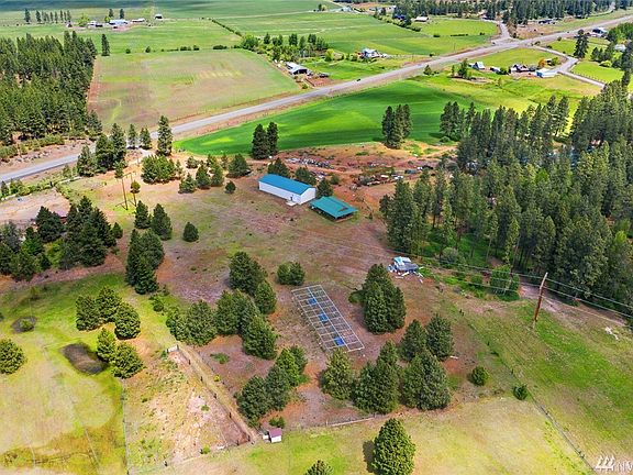 Green house framed structure on property and ready for the gardener within.