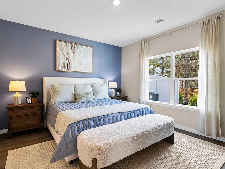 master bedroom with large walk in closet