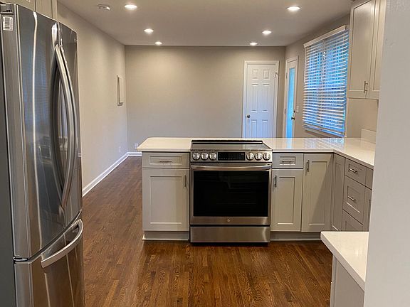 Spacious kitchen and living room.