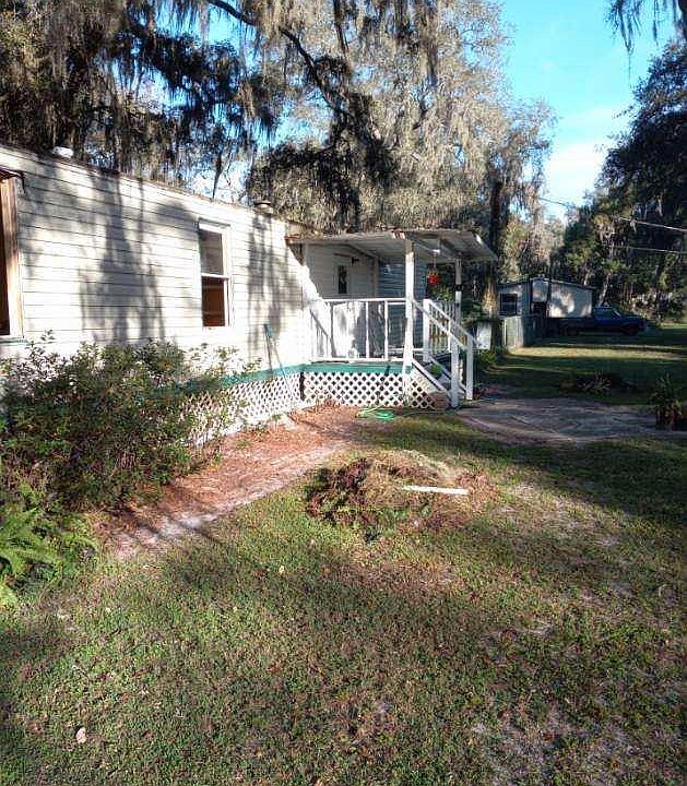 Front View. Small covered porch. Quiet and safe neighborhood.