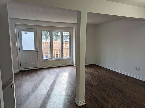 Open Concept LR, DR, Kitchen, also has direct access to a backyard deck.