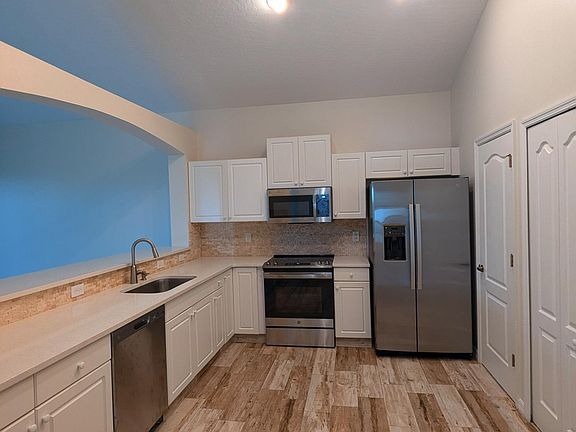 Kitchen with stainless steel appliances