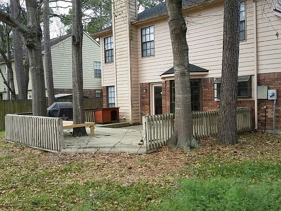 Back yard, grill and dog house
