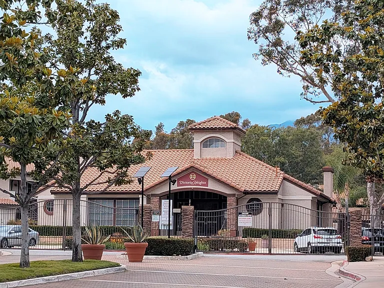 Gated community with club house, fitness center, pool, and tennis courts