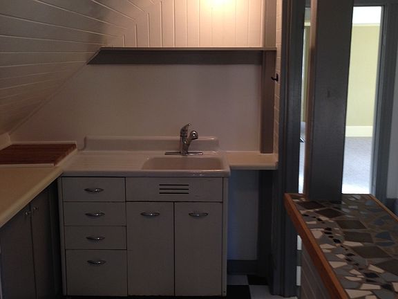kitchen entry w/ bar and sink