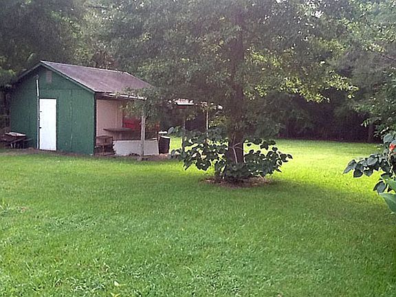 Backyard w/storage/workshop