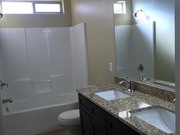 Main bathroom. In hallway. Double sinks straight across hallway from both 2 bedrooms