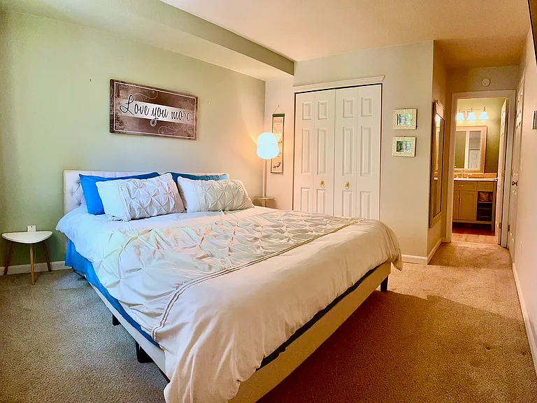 Primary bedroom with 2 closets, plenty of storage.