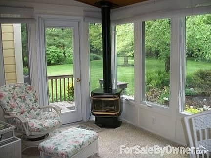 Insulated porch w/ gas log fireplace
						:
						BBQ deck on left