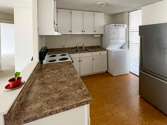 Stack Washer and Dryer conveniently located in the unit