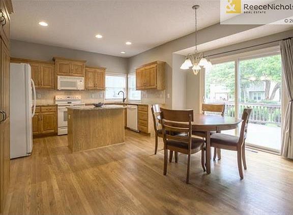 Eat in kitchen overlooks deck/backyard