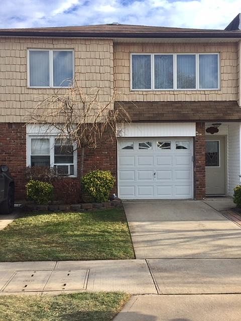 Front of home with Garage/Driveway