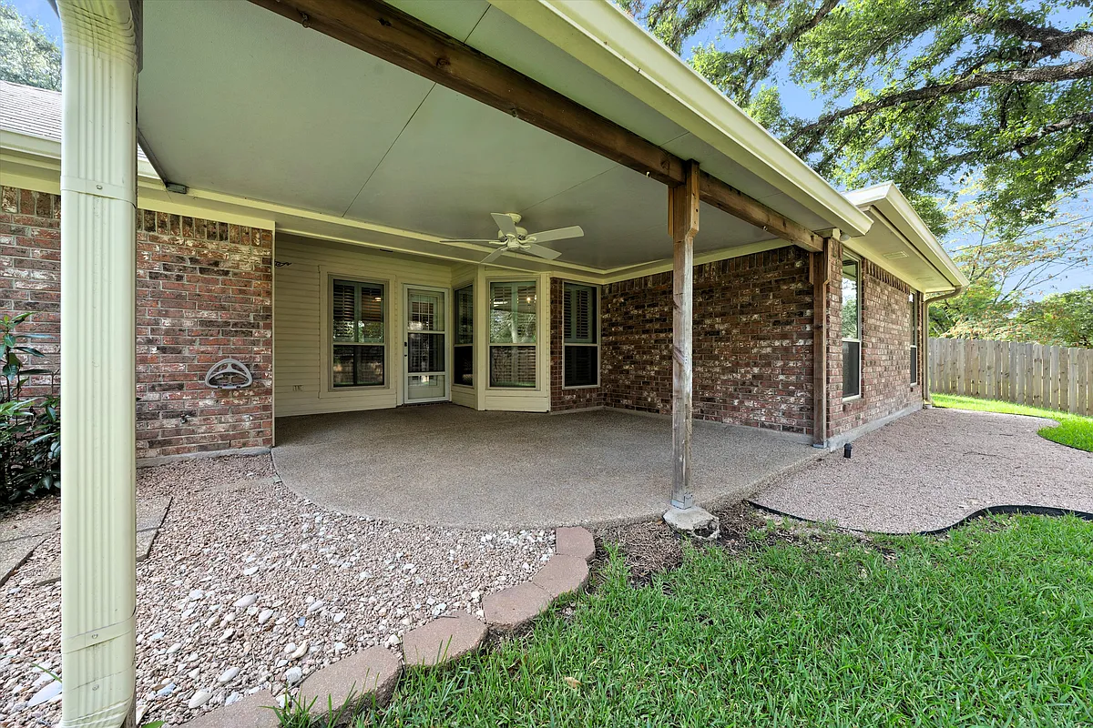 The covered patio is a delight for outdoor dining and relaxing - 2015 Real Dr