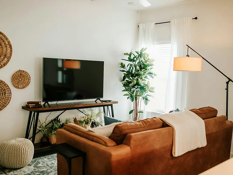 Gather, relax, and unwind. This living space combines style and comfort for the perfect home away from home feel.