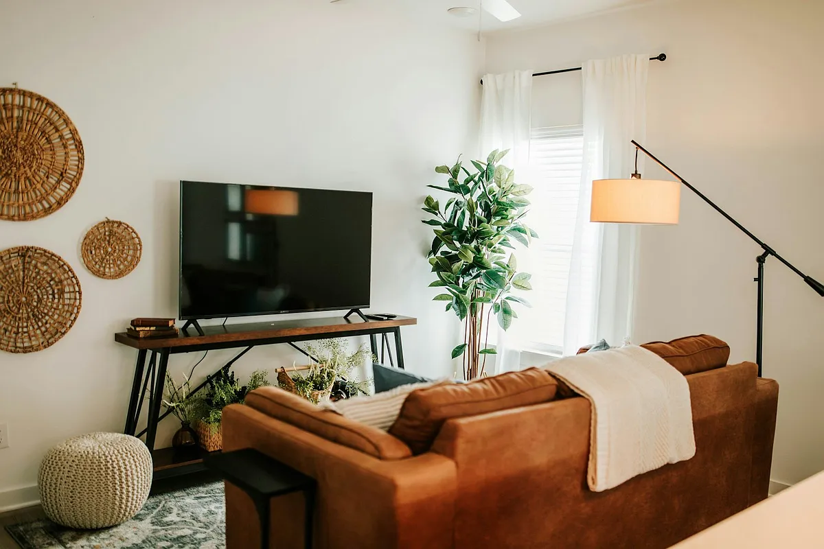 Gather, relax, and unwind. This living space combines style and comfort for the perfect home away from home feel. - 284 Bailey St #420