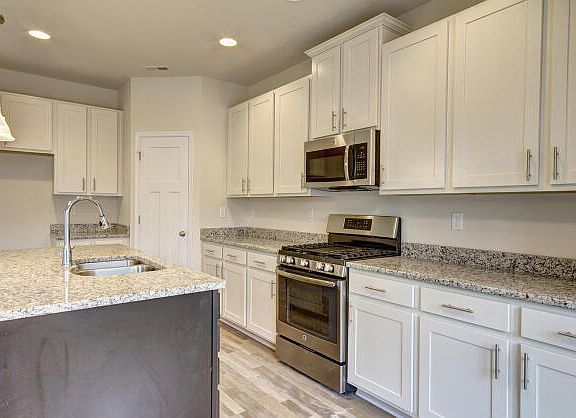 These photos are representative of this floor plan, but all options may not be available in every co