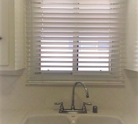 Kitchen window over kitchen sink with great blinds !
