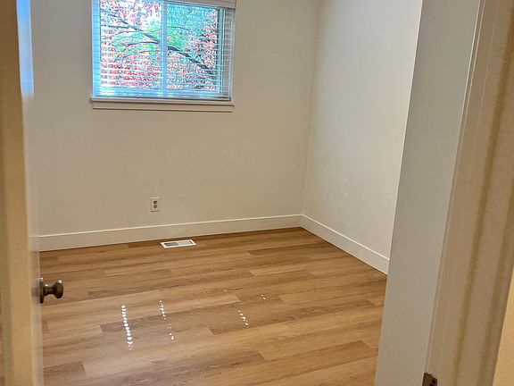 Each bedroom has new flooring, paint, window sills and blinds.