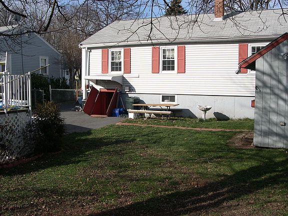 Back of home and corner of over sized shed