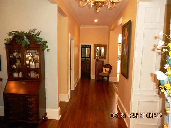 Beautiful wide entry hall. Heart pine floors