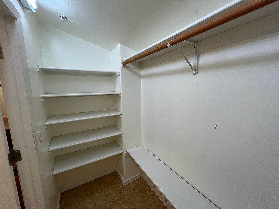 extra storage room behind bathroom