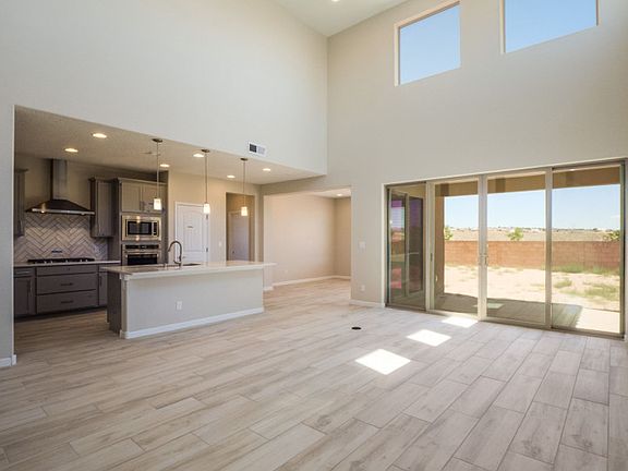 Large sliding glass doors for your backyard access.