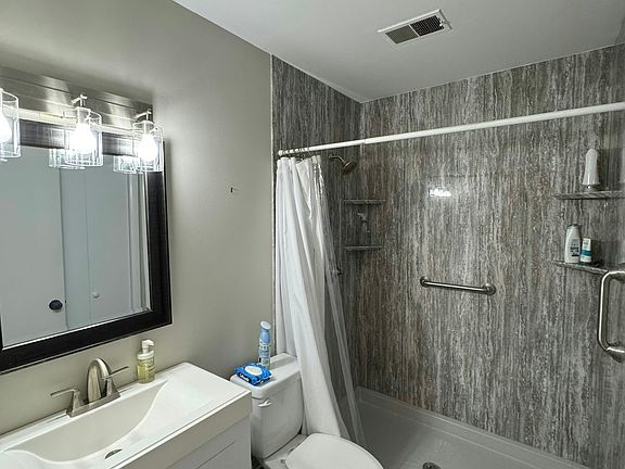 Clean, well appointed bathroom.